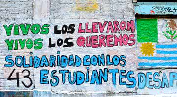 Muro pichado em manifestação da época - Wikimedia Commons